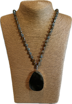 Medallion on long beads