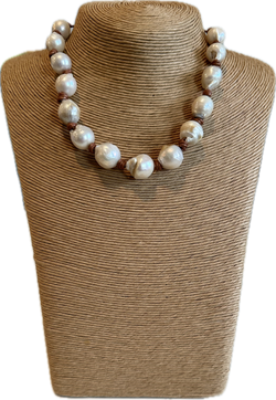 Pearls on brown cord