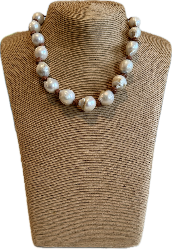 Pearls on brown cord